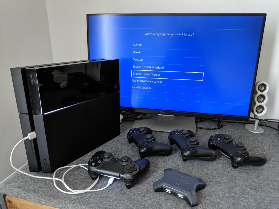 PlayStation 4 with 4x DualShock 