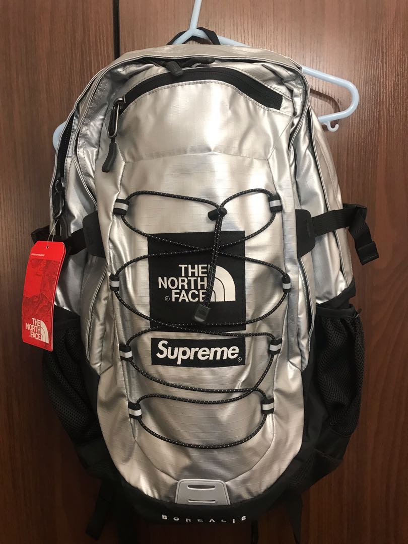 Supreme north shop face backpack silver