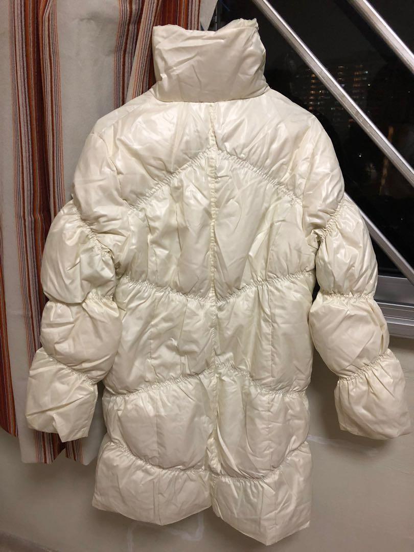 Winter Jacket (Category: Coats, Jackets and Outerwear) located in Singapore. Submitted by pumpkim76 (Listing ID 252847210, Image 2). Description: -Winter Down jacket, trendy design - used once & still in good condition - ivory white colour - PTP: 52cm, length: 89cm - suitable for travelling cold countries: Japan, Korea etc. - 100% polyester - Padding 90% down, 10% feather - inside is greenish colour (see picture) - bought at about $90 .