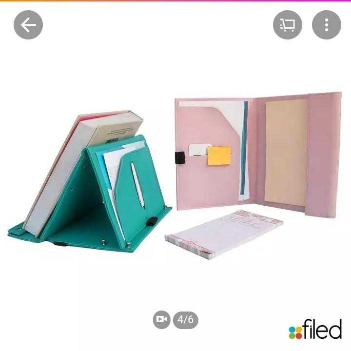 FILED Book Angler (Category: Stationery & School Supplies) located in Manila. Submitted by b2dazzle (Listing ID 253029101, Image 2). Description: Filed Book Angler • Leatherette Organizer Bookstand from Filed (bought last week at FULLYBOOKED SMNE for P845; just tried it on loool) • 8" x 10" x 1.5" (when closed) • Can also serve as a mini folder when not used as a bookstand • Garter closure to keep your papers in place • Expandable pen loop, perfe