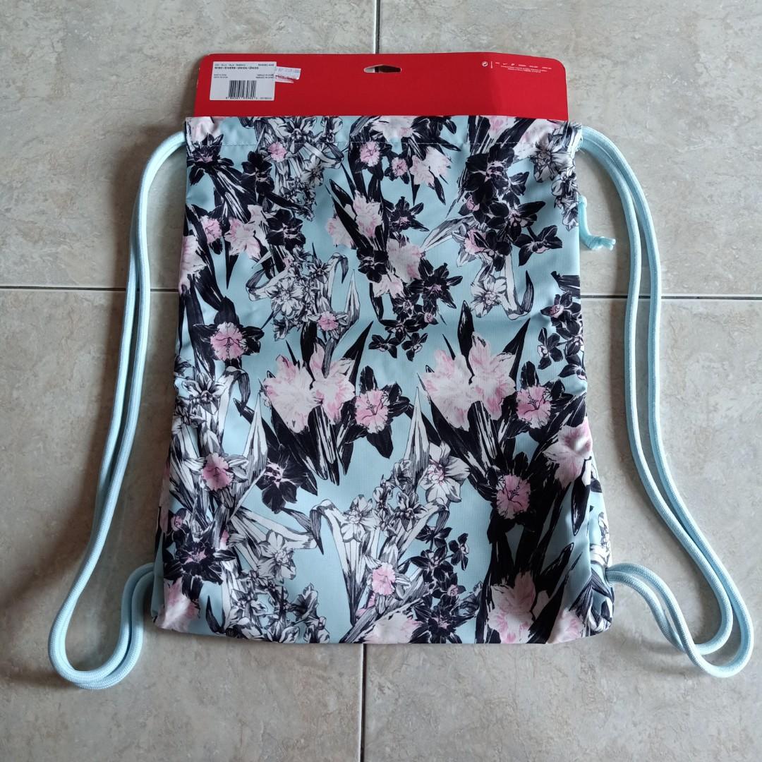 Nike floral drawstring bag online