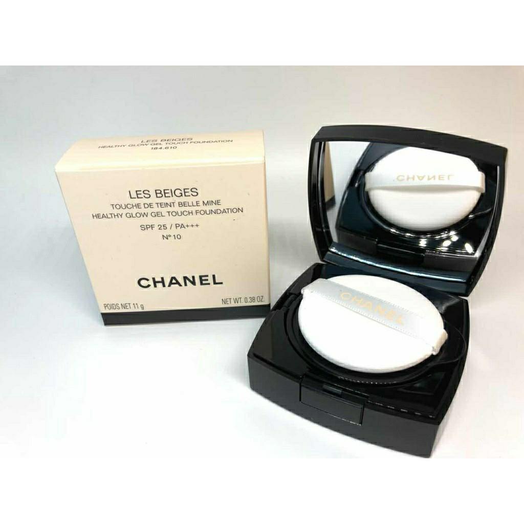 Chanel Vitalumiere loose powder foundation with kabuki brush in