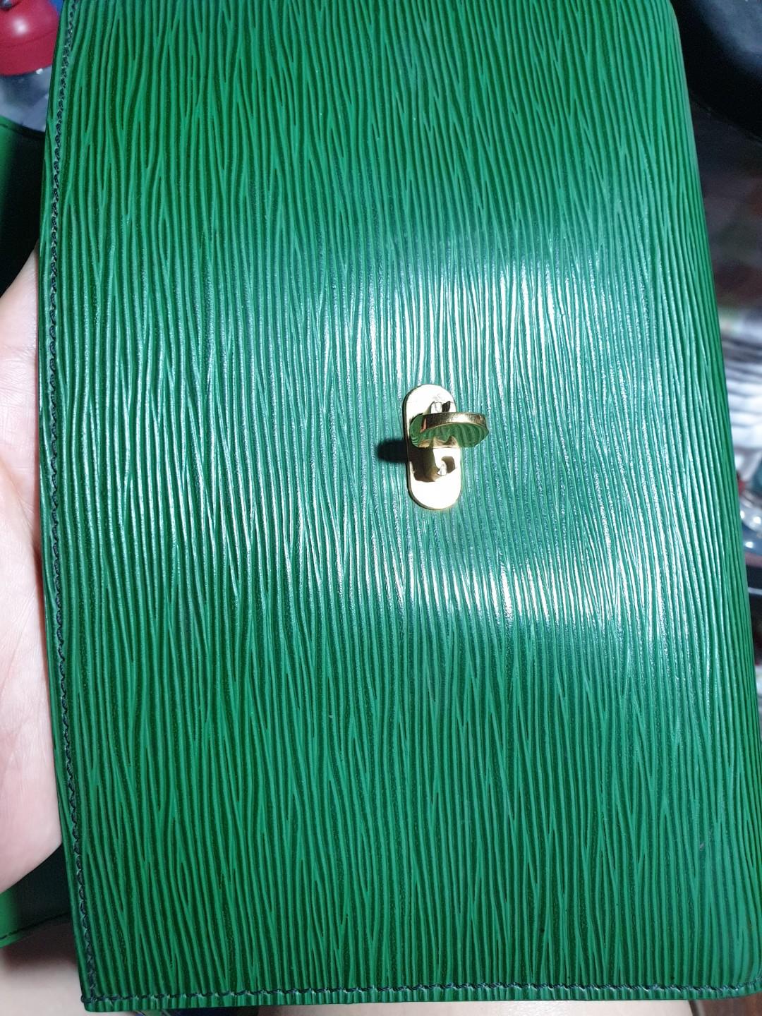 Louis Vuitton Epi Green Pochette Archer (Category: Luxury Bags & Wallets) located in Quezon City. Submitted by littletenshi711 (Listing ID 230072833, Image 3). Description: •Pochette archer clutch •Bag and dustbag •Bought from Japan •Flaws : Inside pocket.
