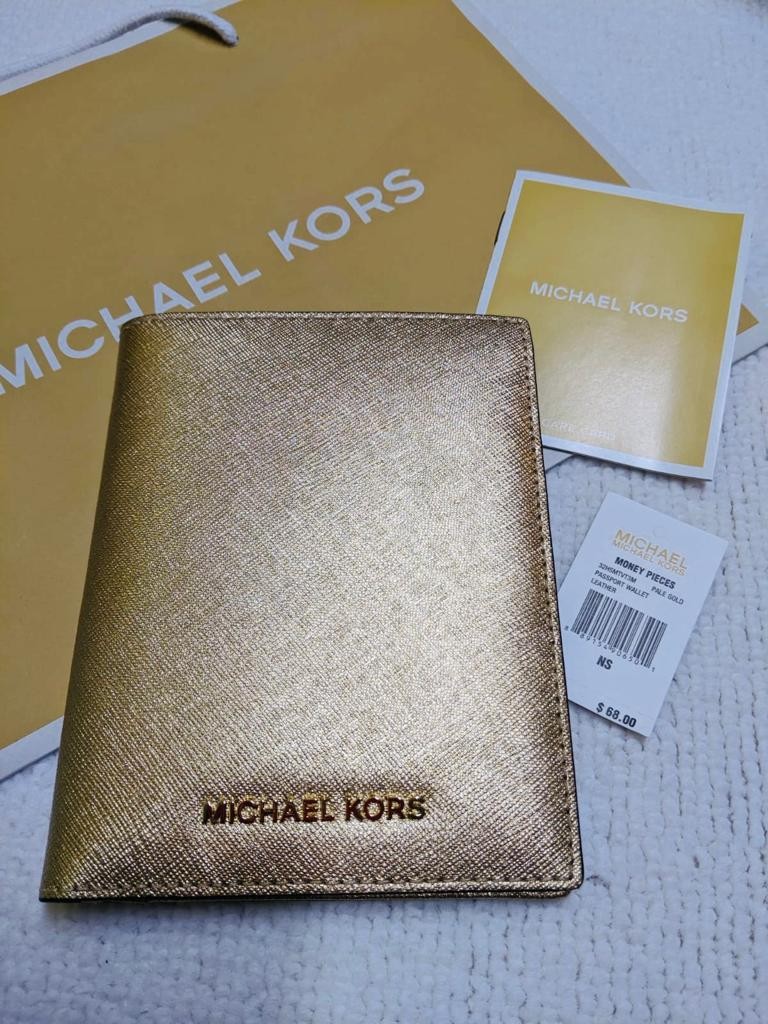 Michael Kors gold passport holder, Luxury, Carousell