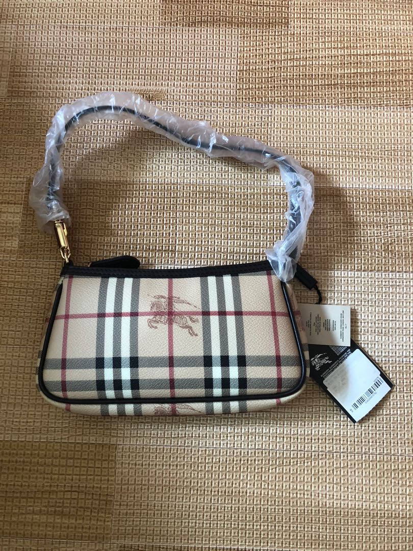 Burberry small store sling bag