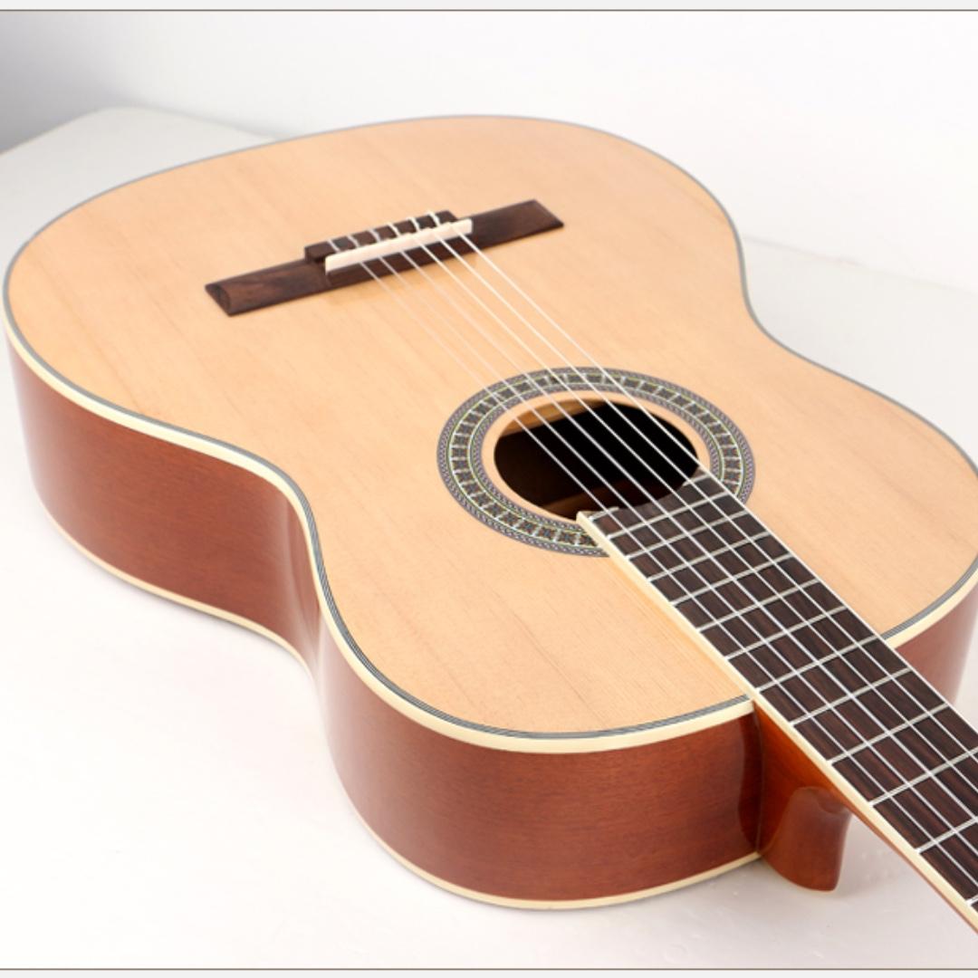 Deviser Classical Guitar (Category: Musical Instruments) located in Singapore. Submitted by musicalfreak (Listing ID 253982124, Image 3). Description: Brand: Deviser Model: L-350N-39 Size: 39 inch String: Nylon Top: Spruce Back and side: Sapele Fingerboard: Rosewood Neck: Mahogany Finishing: High Gloss Free Gifts: Guitar Bag Guitar Thumb Pick Pearl Guitar Pick x 3 Guitar Pickbox.