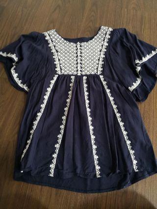 Embroidered Top with flared sleeves
