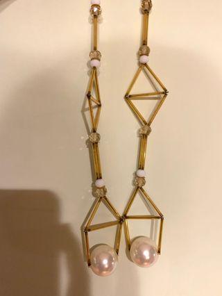 Your hands miss pearl necklace