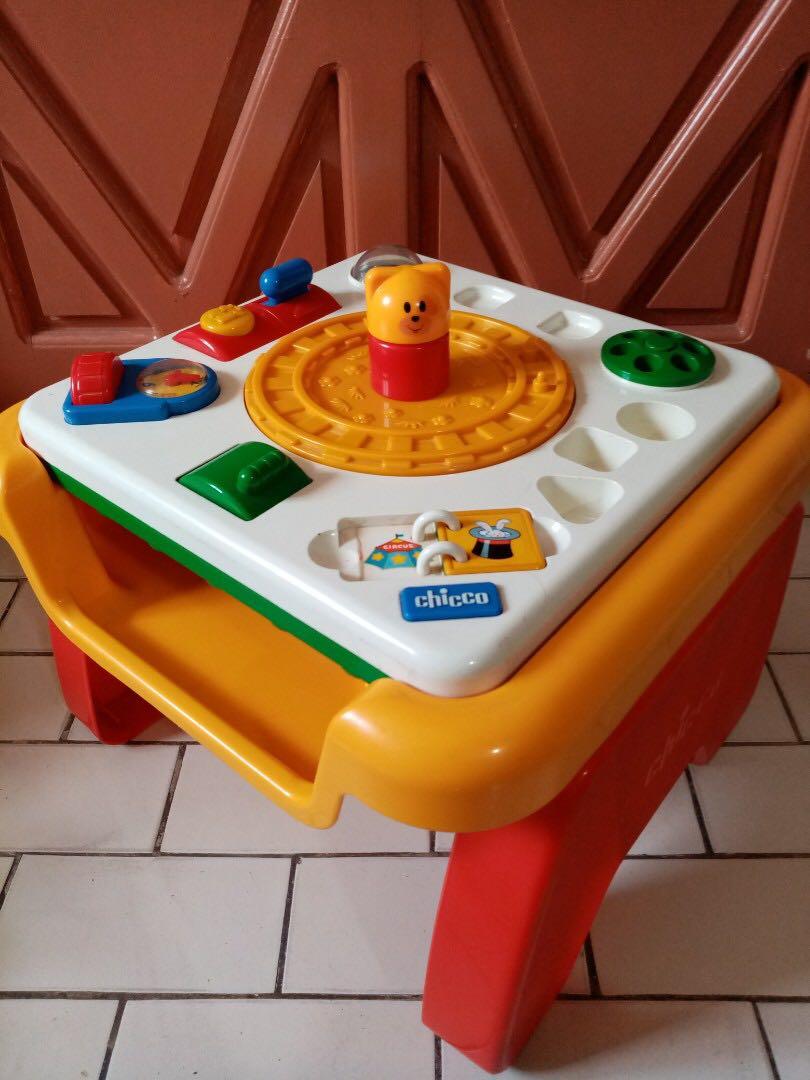 FLIP AND PLAY ACTIVITY TABLE (Category: Infant Playtime) located in Pasig City. Submitted by rxjmn (Listing ID 233772803, Image 1). Description: #BEST2019 **100 PESOS OFF when you pair this with any item in my catalog! Ideal for stimulating child's coordination and education skills with multi-activities. Comes with 3 letter /number blocks, 2 Character blocks, and 12 building blocks. (Toy phone and train missing, but other parts are still in good 