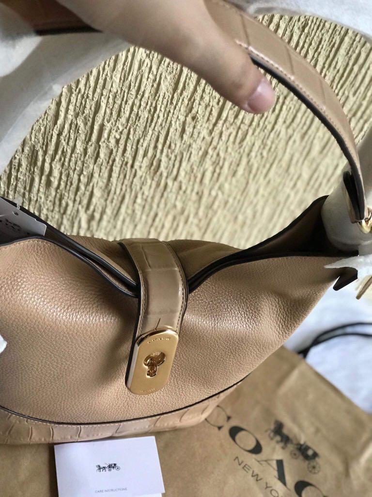 Coach amber duffle top