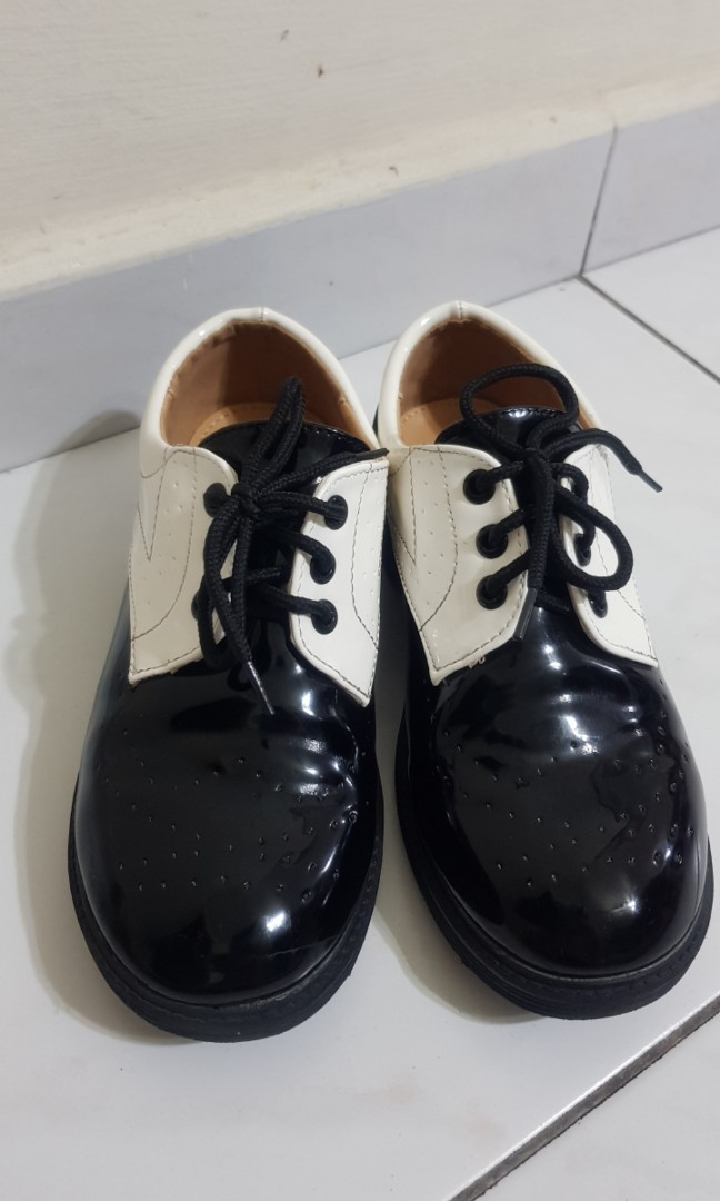 black and white leather shoes