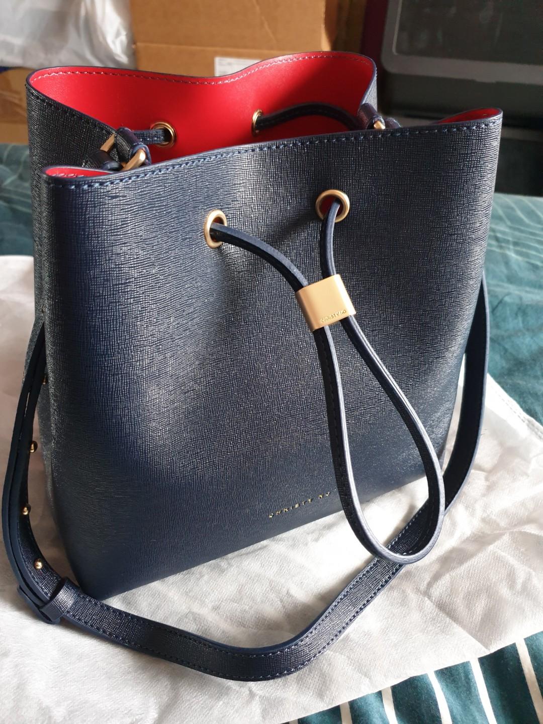 Christy Ng Bucket Bag (Memphis) Blue, Women's Fashion, Bags & Wallets,  Cross-body Bags on Carousell