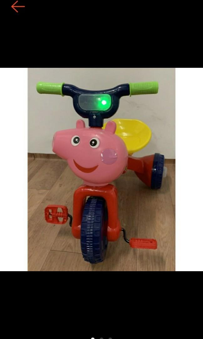 peppa pig riding a bike toy