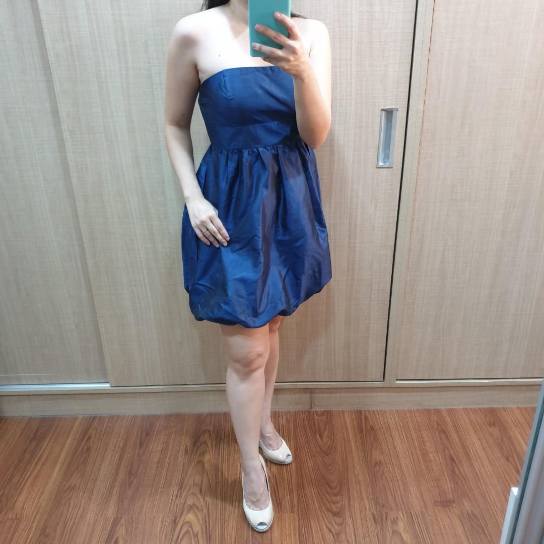 F21 Party Tulip Dress (Category: Dresses) located in Quezon City. Submitted by kkookies (Listing ID 254876887, Image 1). Description: Classy yet fun, this dress is a must-have for those parties when you want to look extra special 😉. Fabric looks elegant, like shantung silk (but it is not). When you move, it looks likes 2 shades of navy. So special. Fabric is not stretchy but the bustline is slightly garterized to fit your bust perfectly. Brand n