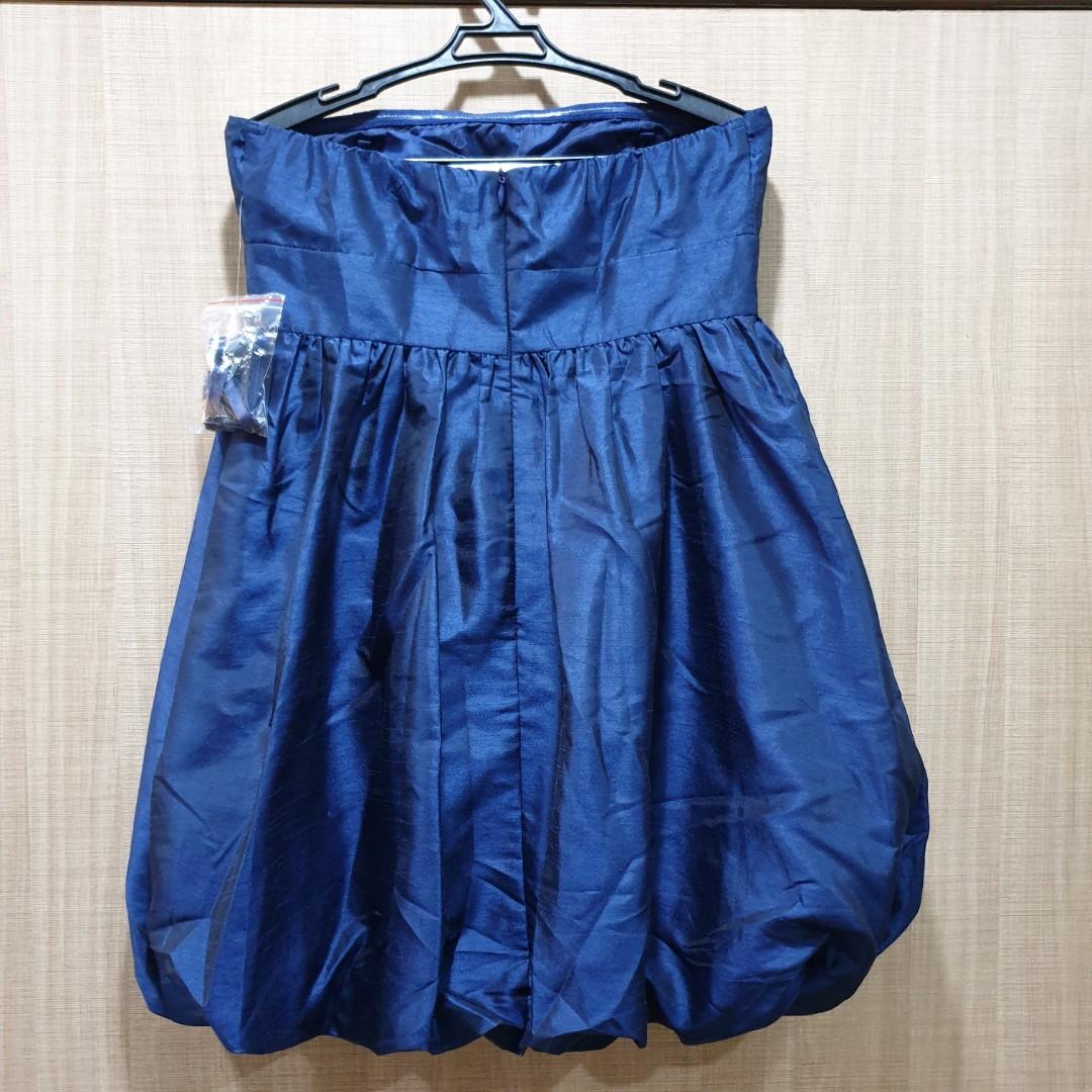 F21 Party Tulip Dress (Category: Dresses) located in Quezon City. Submitted by kkookies (Listing ID 254876887, Image 3). Description: Classy yet fun, this dress is a must-have for those parties when you want to look extra special 😉. Fabric looks elegant, like shantung silk (but it is not). When you move, it looks likes 2 shades of navy. So special. Fabric is not stretchy but the bustline is slightly garterized to fit your bust perfectly. Brand n