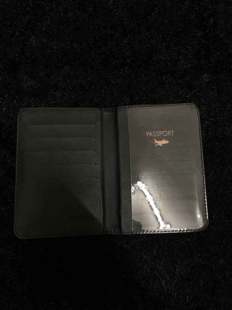 Typo passport holder , Luxury, Bags & Wallets on Carousell