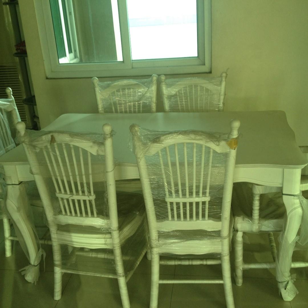 Classic White dining table (armchairs without armrest) (Category: Chairs) located in Manila. Submitted by k3788 (Listing ID 255088776, Image 3). Description: 6 chairs (2 chairs with armrest and 4 without armrest). dining table white classic wooden free delivery for nearby metro manila locations. please pm. 53000 original price..