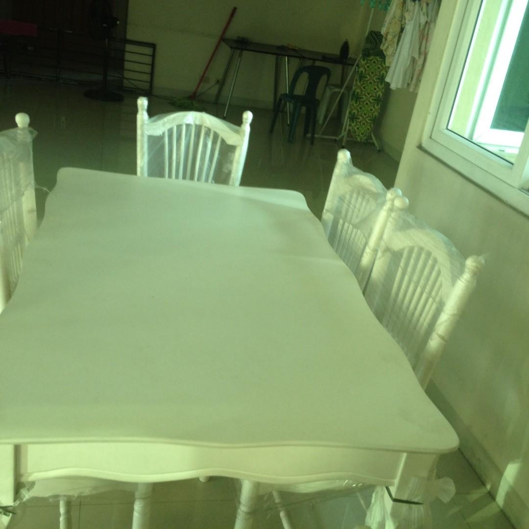 Classic White dining table (armchairs without armrest) (Category: Chairs) located in Manila. Submitted by k3788 (Listing ID 255088776, Image 1). Description: 6 chairs (2 chairs with armrest and 4 without armrest). dining table white classic wooden free delivery for nearby metro manila locations. please pm. 53000 original price..