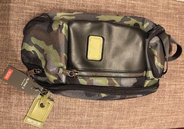 Tumi camo discount sling bag