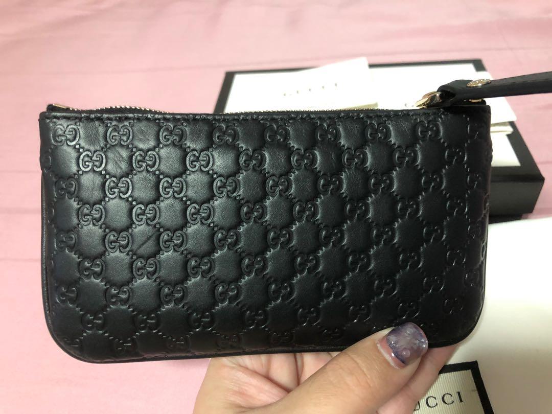 Gucci signature wrist wallet 2025