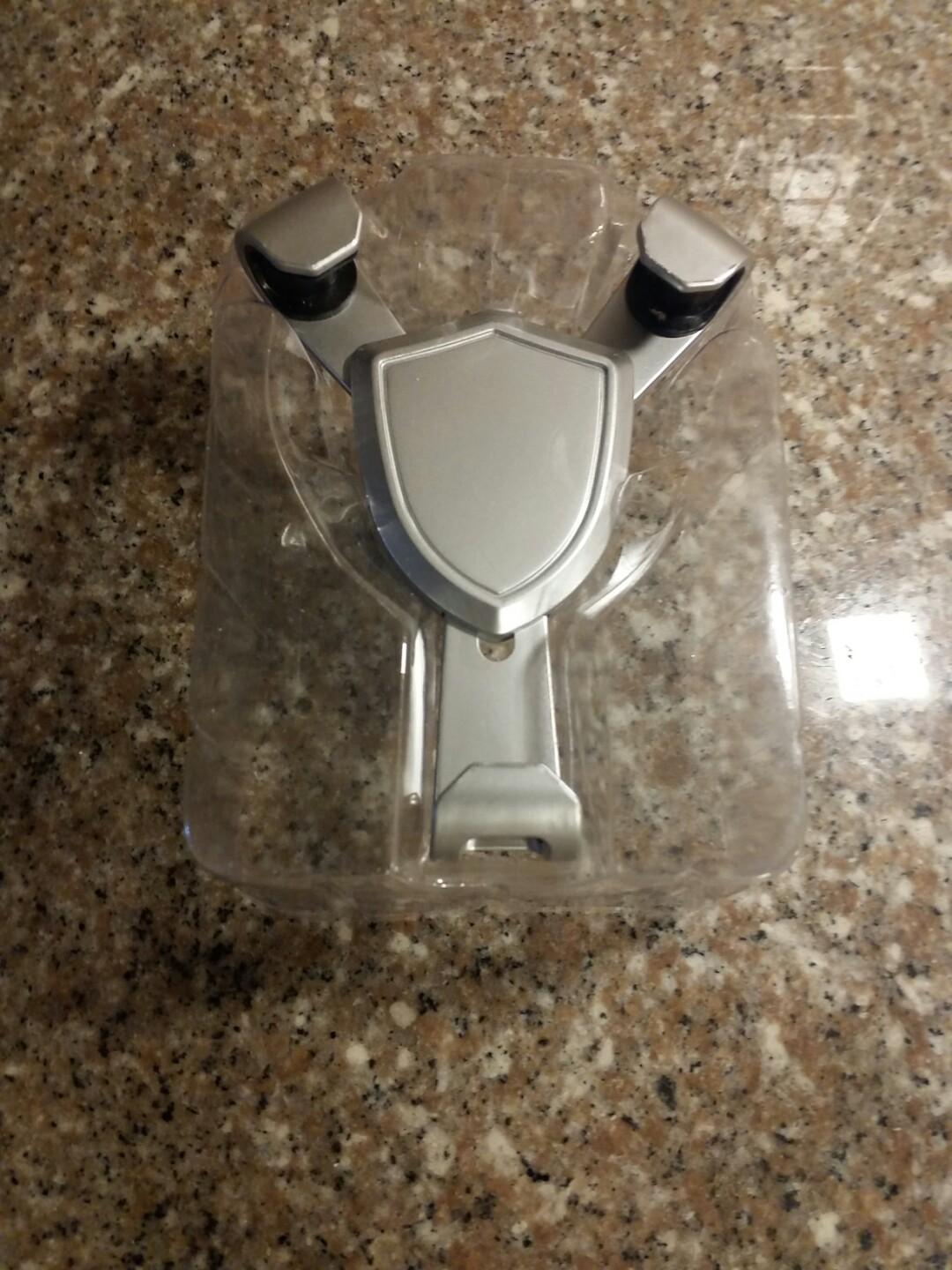 Phone Car Holder (Category: Mounts & Holders) located in Lapu Lapu. Submitted by everydays_needs (Listing ID 255330414, Image 2). Description: Brand new mobile phone car holder. Gray Color Fits on various cellphones since it can extend Box with creased but good unit.