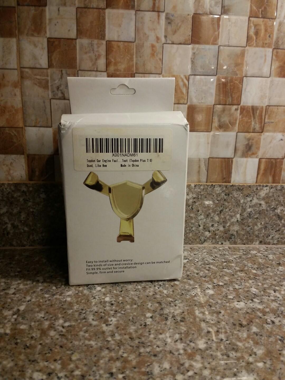 Phone Car Holder (Category: Mounts & Holders) located in Lapu Lapu. Submitted by everydays_needs (Listing ID 255330414, Image 1). Description: Brand new mobile phone car holder. Gray Color Fits on various cellphones since it can extend Box with creased but good unit.
