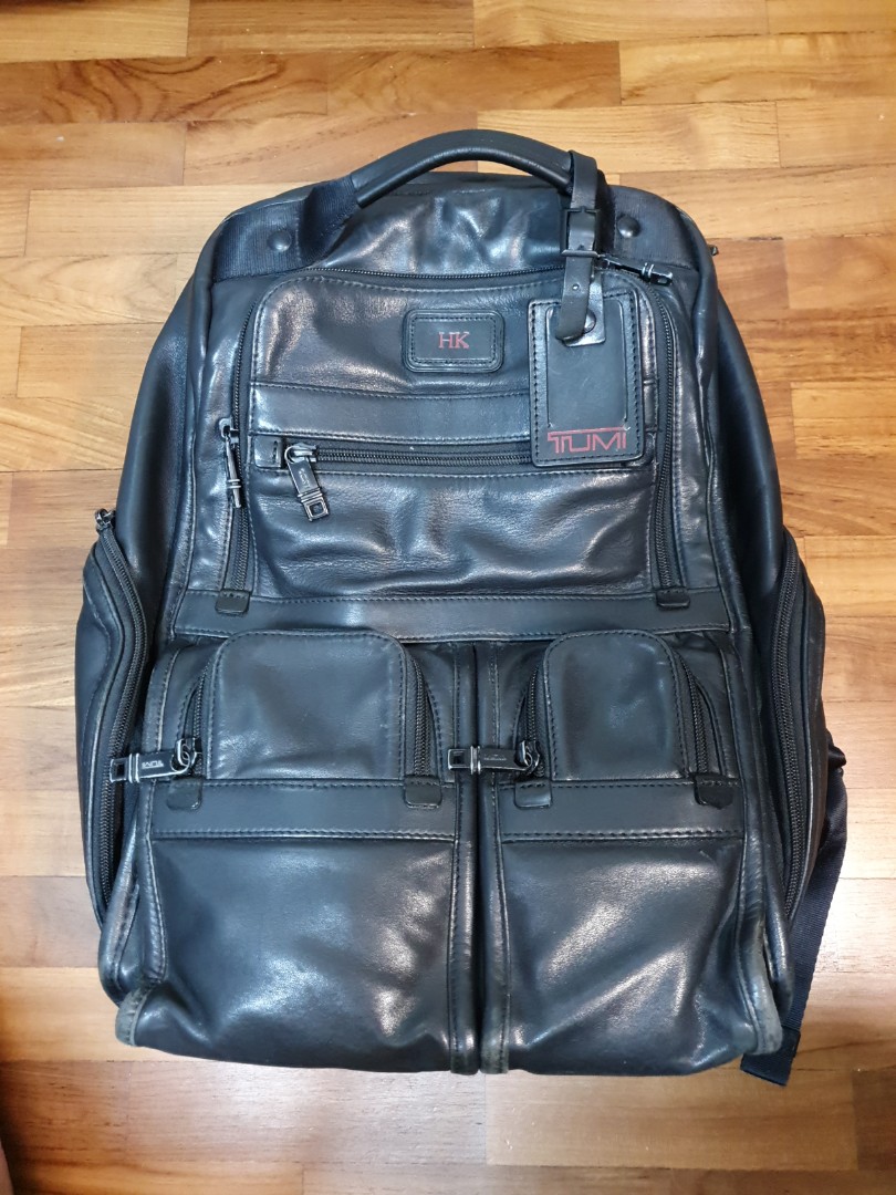 tumi blue leather backpack