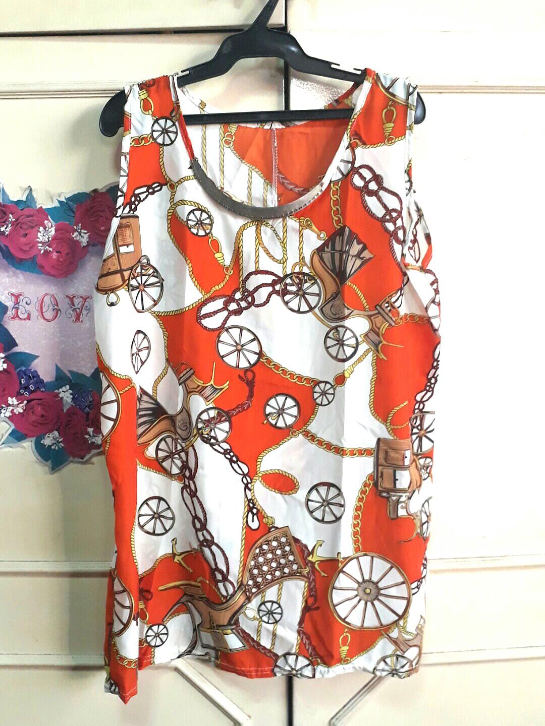 Fancy top w/ metal plate necklace (Category: Others Tops) located in Paranaque City. Submitted by dearmissy (Listing ID 255896147, Image 1). Description: Bought from Bangkok :) smooth and flowy fabric..so comfortable to wear and as if there's a gold necklace attached in front :).