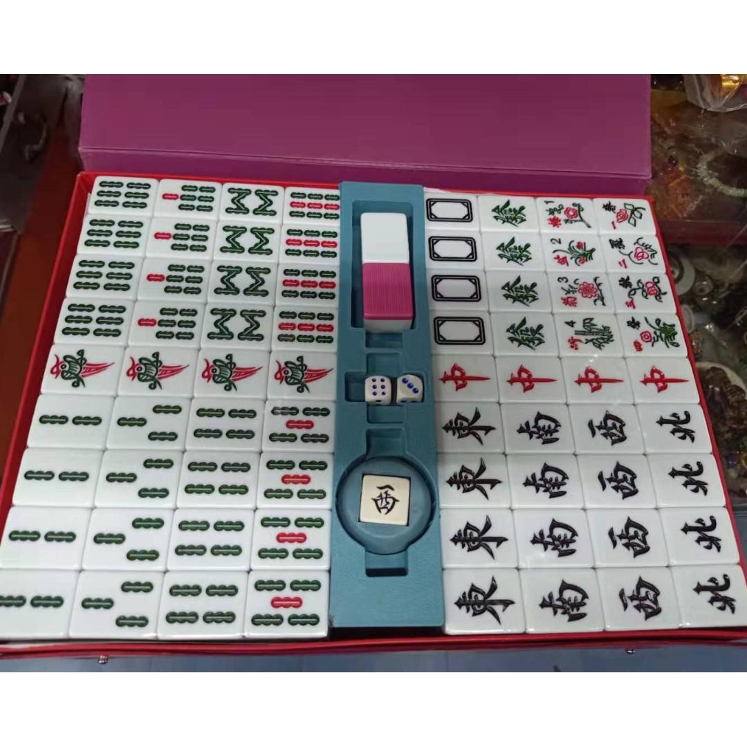 Mahjong Set Regular/ Standard Sized (Pink) (Category: Board Games & Puzzles) located in Manila. Submitted by julieggggg (Listing ID 255849371, Image 2). Description: Our Mahjong Set Regular/ Standard Size is composed of 144 tiles in each set in a red attache case. Made in Taiwan. The mahjong set's material is made from process solid ivory which is a durable base for players' long term use. If you prefer the mahjong set to have numbers in its char