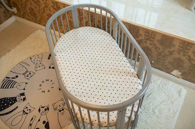oval baby cot