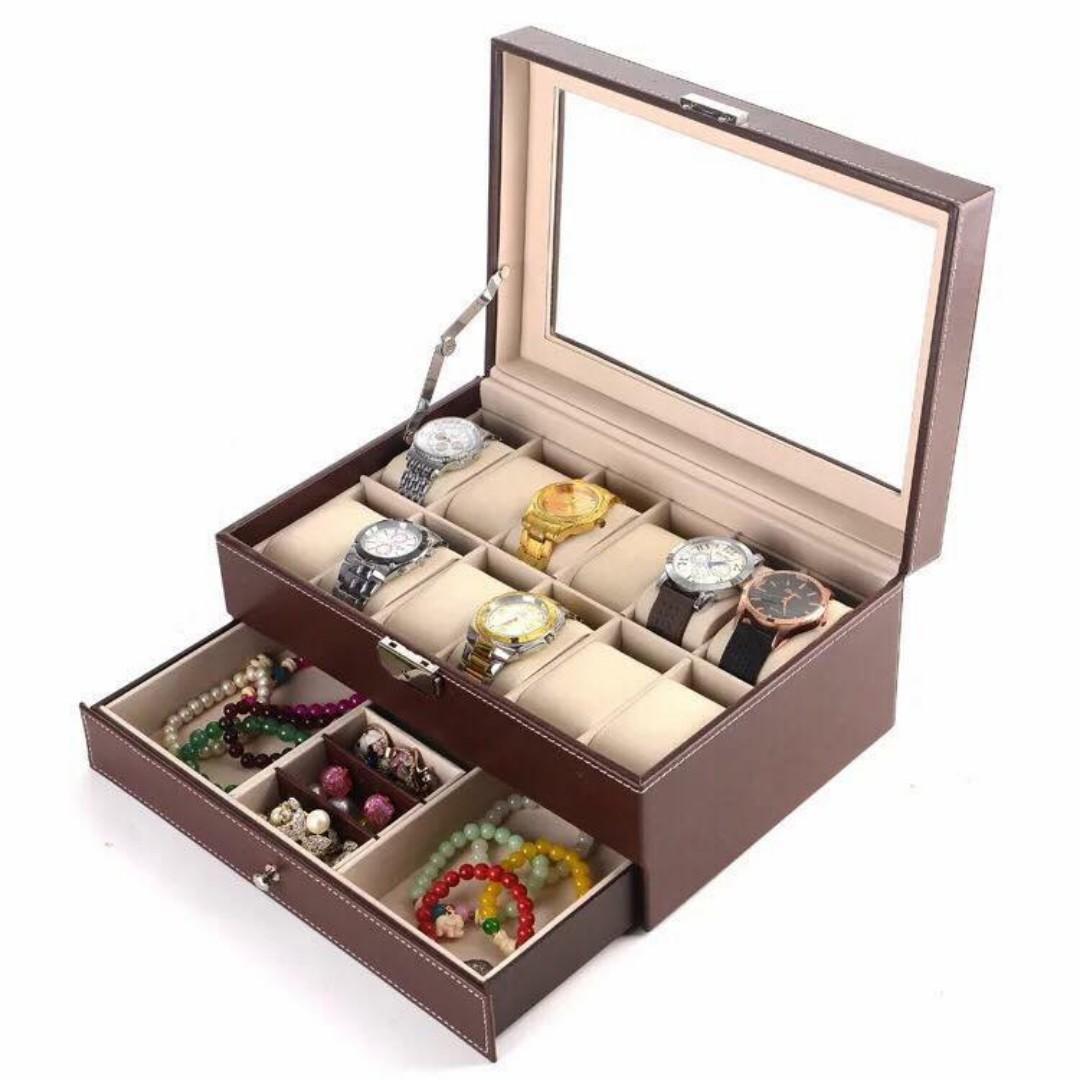 Double Watch Case Watch Storage Box (Category: Storage Boxes & Baskets) located in Manila. Submitted by magicgerry (Listing ID 255995938, Image 1). Description: Watch Jewelry Storage Box with susi (P1,900.00) > 30×20×13cm > AVail. in two colors: Red and Black > With key .