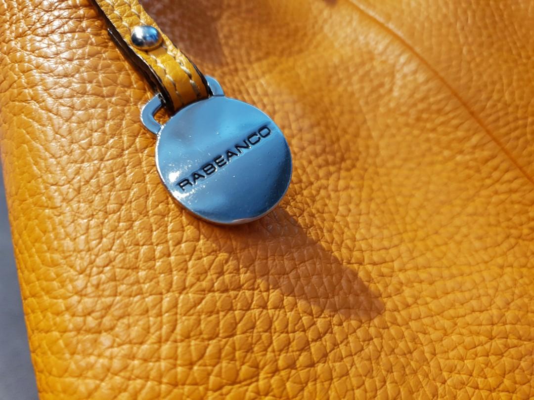 Mustard tote (Category: Tote Bags) located in Mandaluyong City. Submitted by secondipity111 (Listing ID 256068675, Image 2). Description: Rabeanco Alex large tote Classic collection Zipped pouch included Restored and conditioned by Doctor Leather Slightly used.