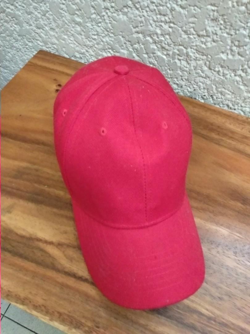 Red Cap (Category: Caps & Hats) located in Manila. Submitted by thejaypee (Listing ID 256004370, Image 1). Description: Red cap. Got as a gift Never been used, nakastore lang sa kwarto. Meet up or shipping.