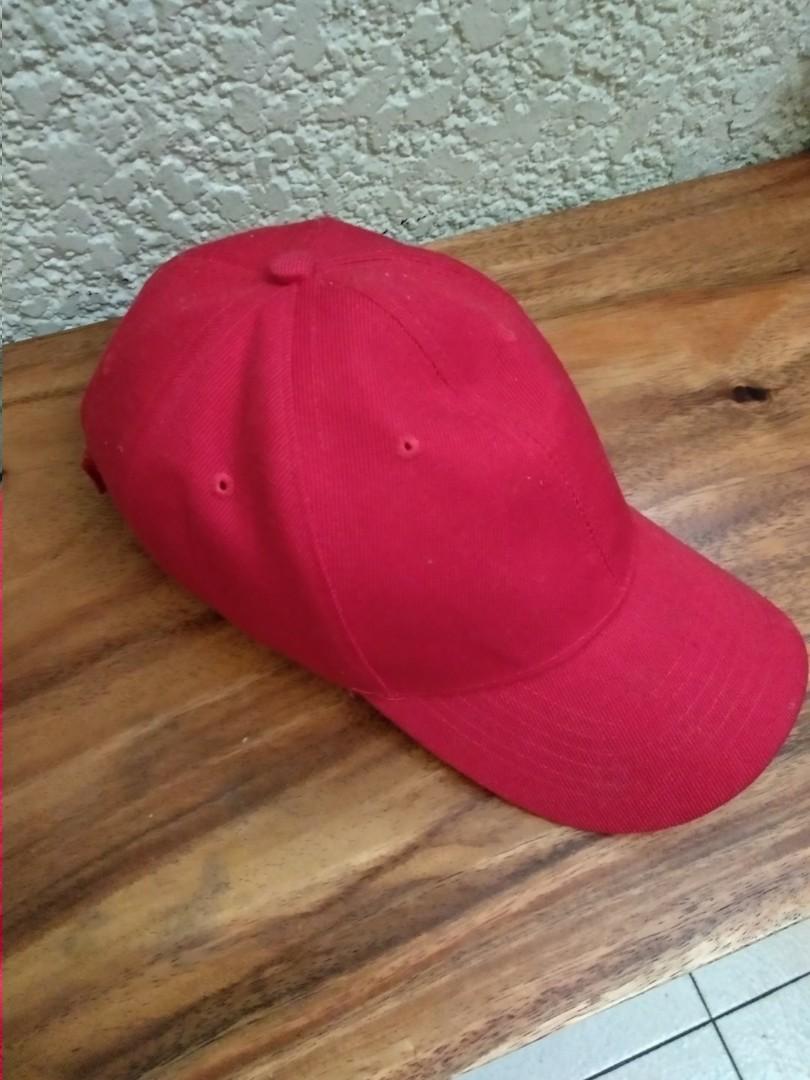 Red Cap (Category: Caps & Hats) located in Manila. Submitted by thejaypee (Listing ID 256004370, Image 2). Description: Red cap. Got as a gift Never been used, nakastore lang sa kwarto. Meet up or shipping.