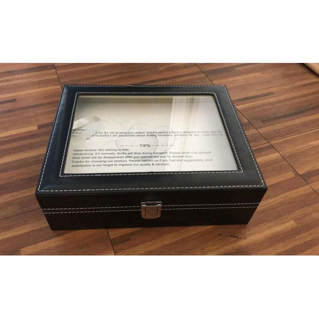 Watch Case Storage Box (Category: Storage Boxes & Baskets) located in Manila. Submitted by magicgerry (Listing ID 255994330, Image 1). Description: Watch Box Large 10 Mens Women's Black Leather Display Glass Top Jewelry Case Organizer (P899.00) > 10 Total Unit Spaces > Vintage Design > Black PU Leather > Dimensions: 26 x 21 x 8cm .