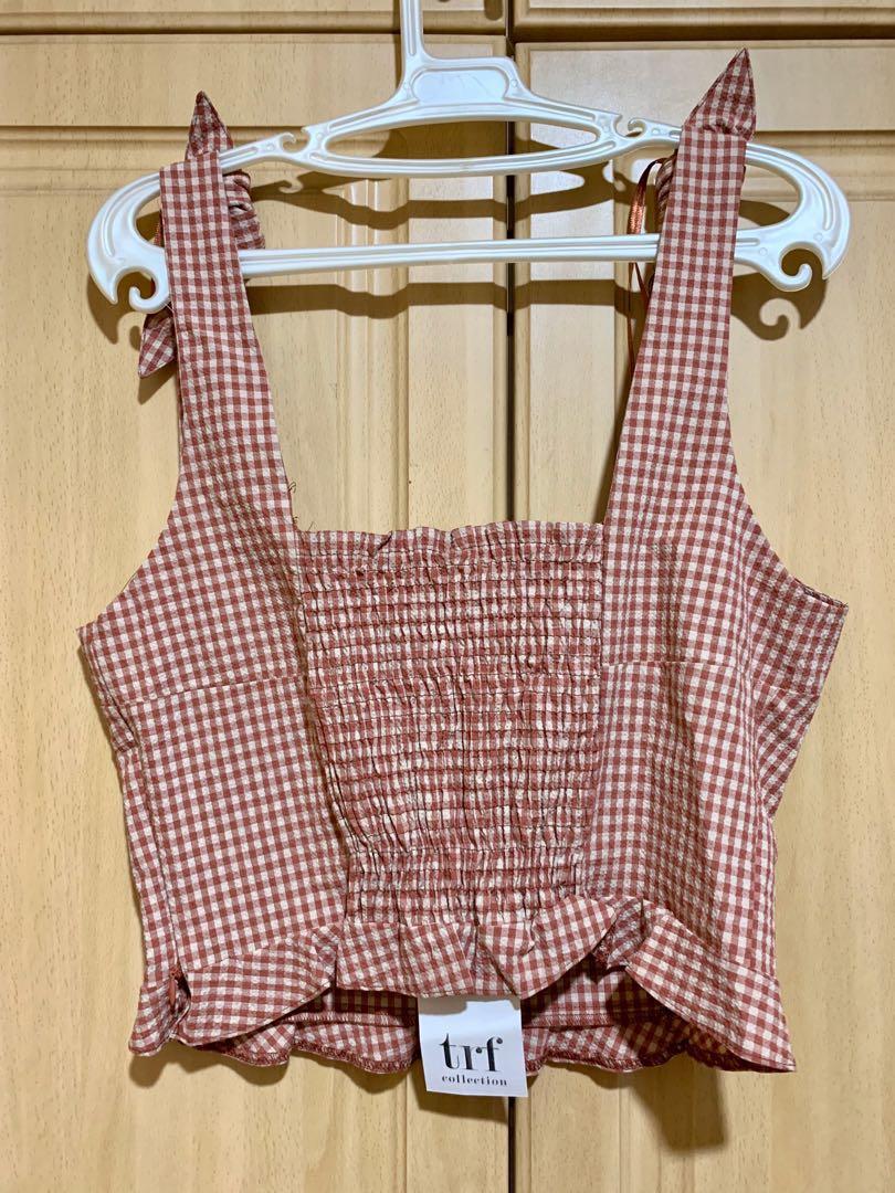 Zara gingham print crop top (Category: Sleeveless) located in Makati City. Submitted by _stepau (Listing ID 256048096, Image 2). Description: Zara gingham print crop top Brand new with tag, bought sometime last year. RFS: impulse buy; don’t need.