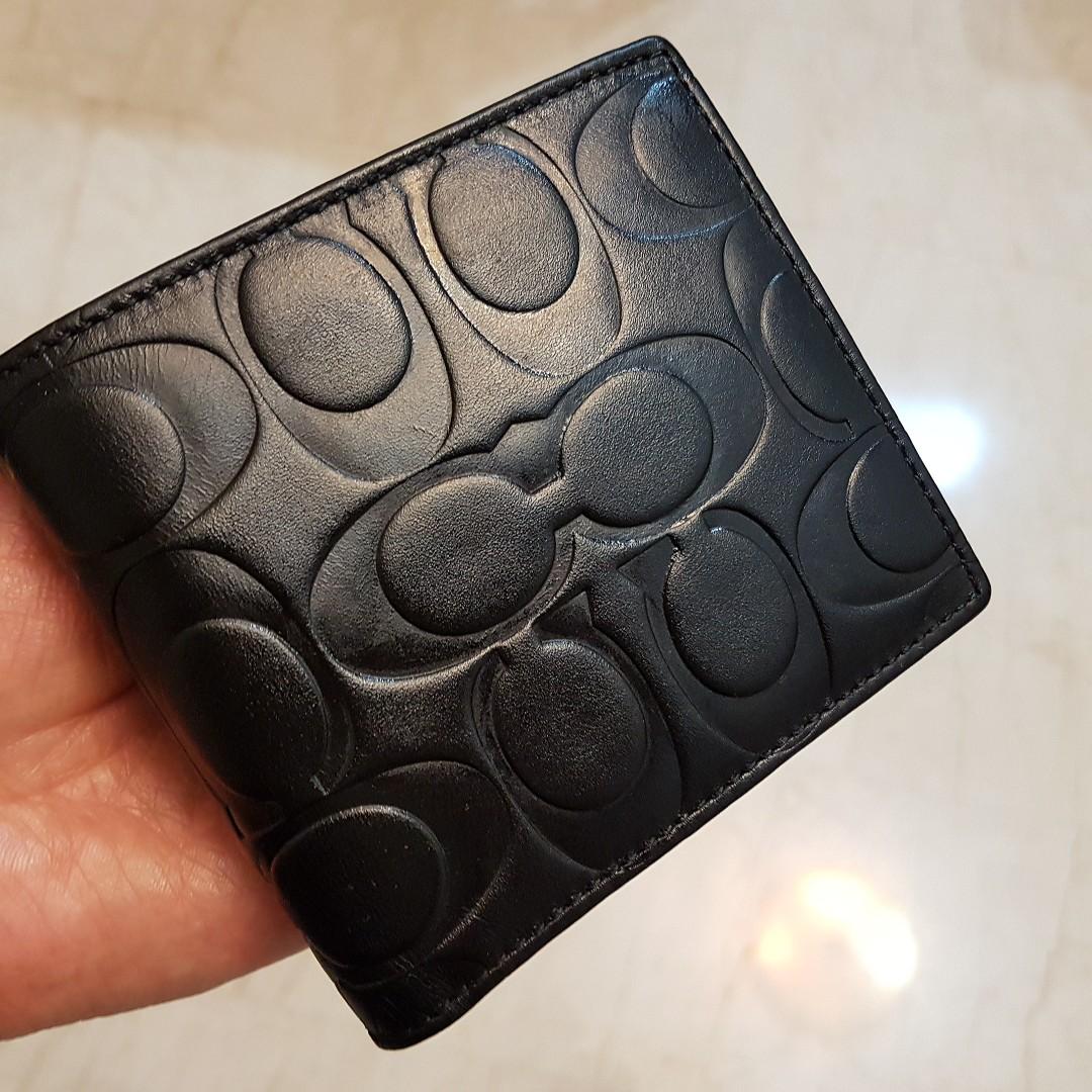 COACH SIGNATURE EMBOSSED BI-FOLD LEATHER WALLET, Men's Fashion, Watches &  Accessories, Wallets & Card Holders on Carousell