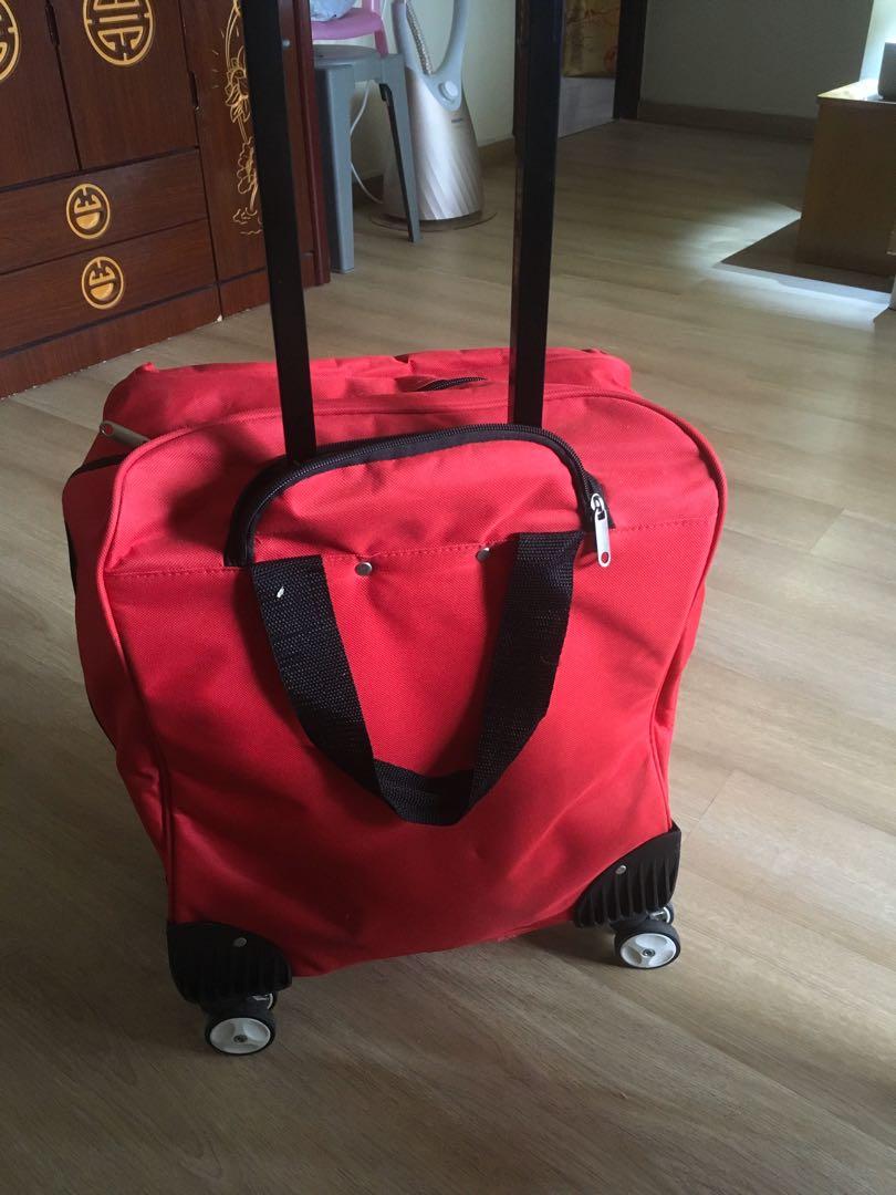 18” Rolling luggage / Carrier, Hobbies & Toys, Travel, Luggage on Carousell