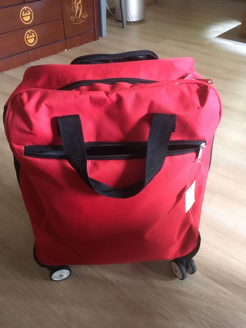 18” Rolling luggage / Carrier, Hobbies & Toys, Travel, Luggage on Carousell
