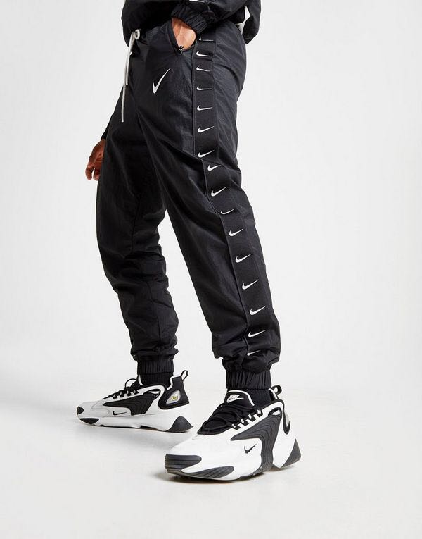 nike swoosh woven track pants