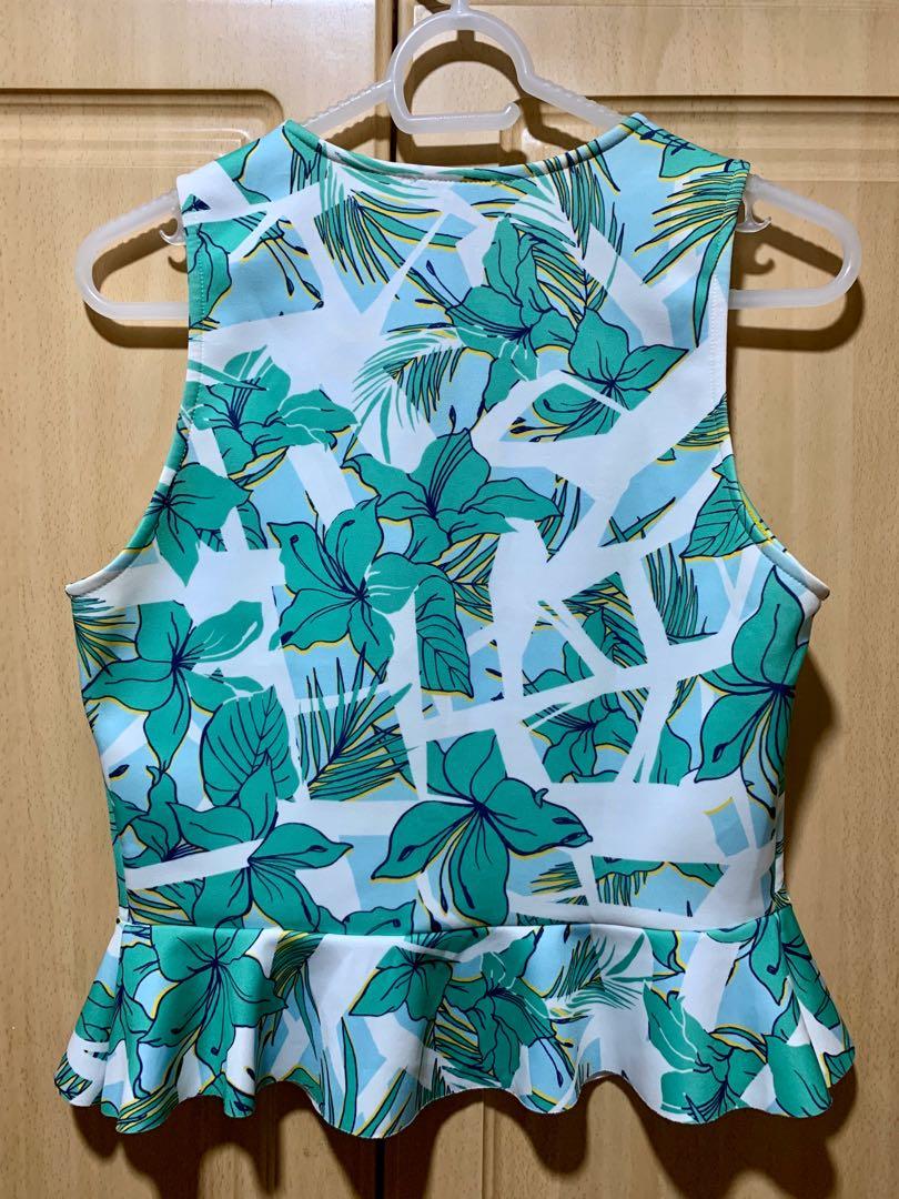 Zara tropical-print peplum top (Category: Blouses) located in Makati City. Submitted by _stepau (Listing ID 256776667, Image 2). Description: Used but in very good condition!.