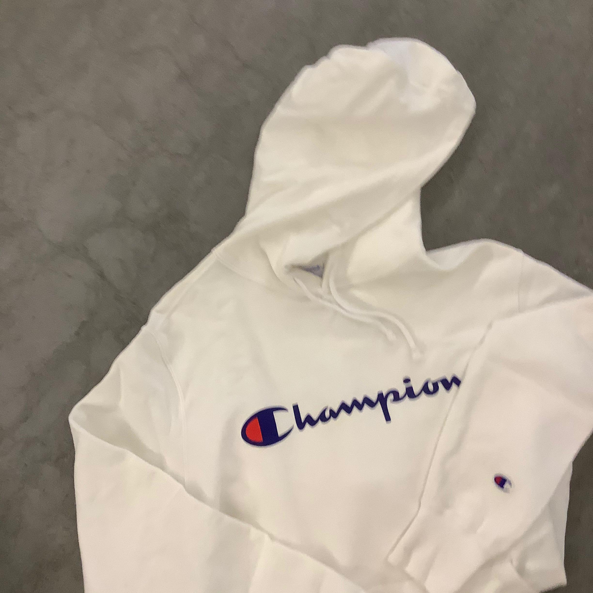 who bought champion clothing