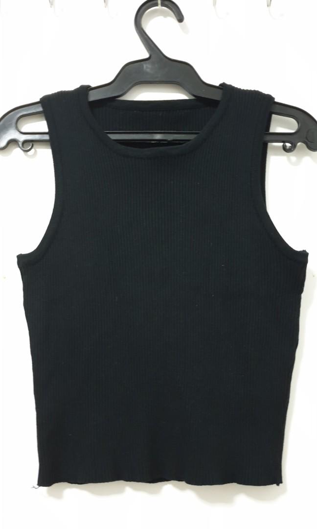 Black Ribbed croptop (reserved) (Category: Sleeveless) located in Manila. Submitted by irisraa (Listing ID 257079664, Image 1). Description: Cute and comfy croptop. Looks new. I used to wear it with skinny jeans and tight skirt for that minimalist sexy vibe but I've outgrown it already. :( fits xs-s.