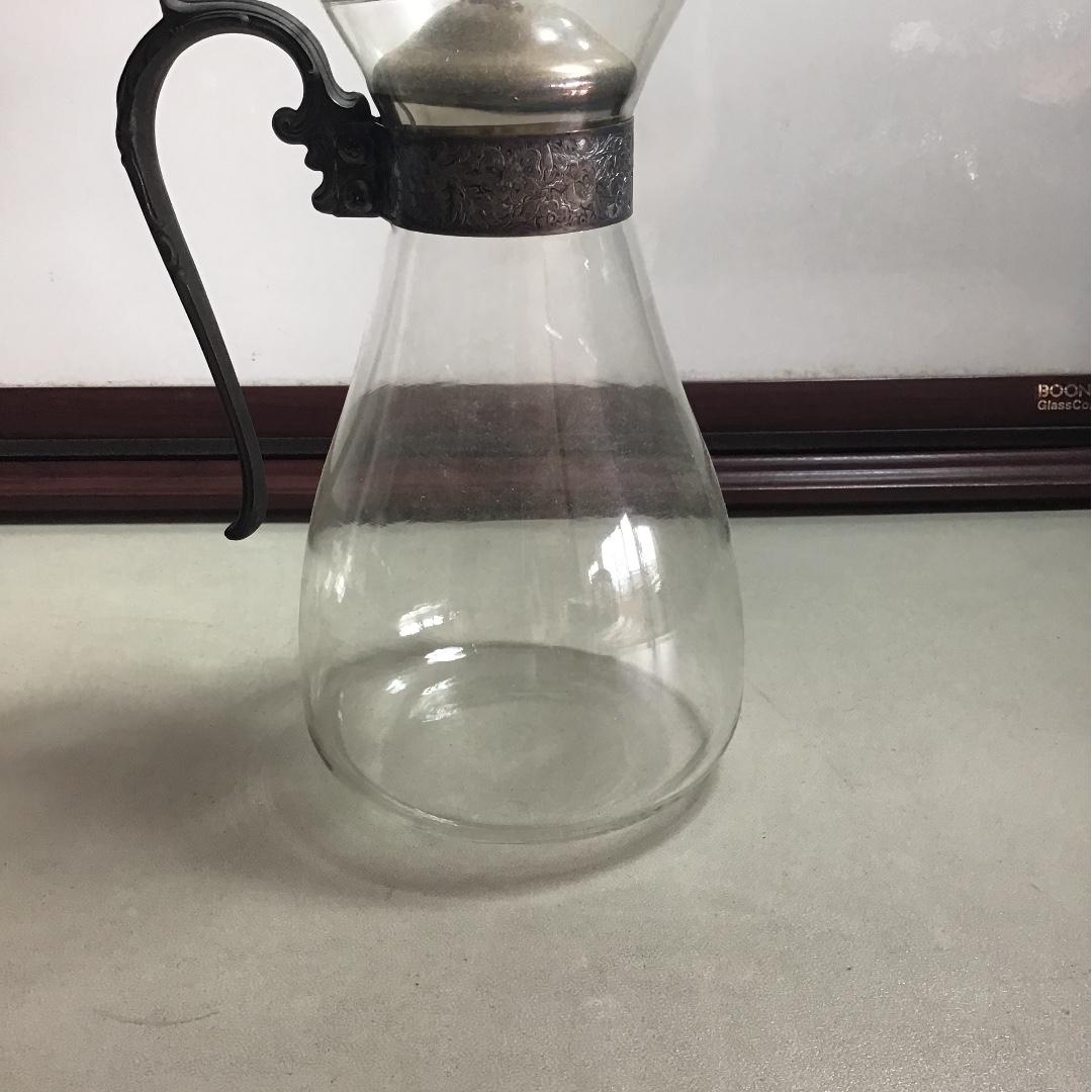 Silver with Glass Carafe (Category: Pitchers & Dispensers) located in Cebu City. Submitted by homewares123 (Listing ID 257094136, Image 1). Description: Cover included.