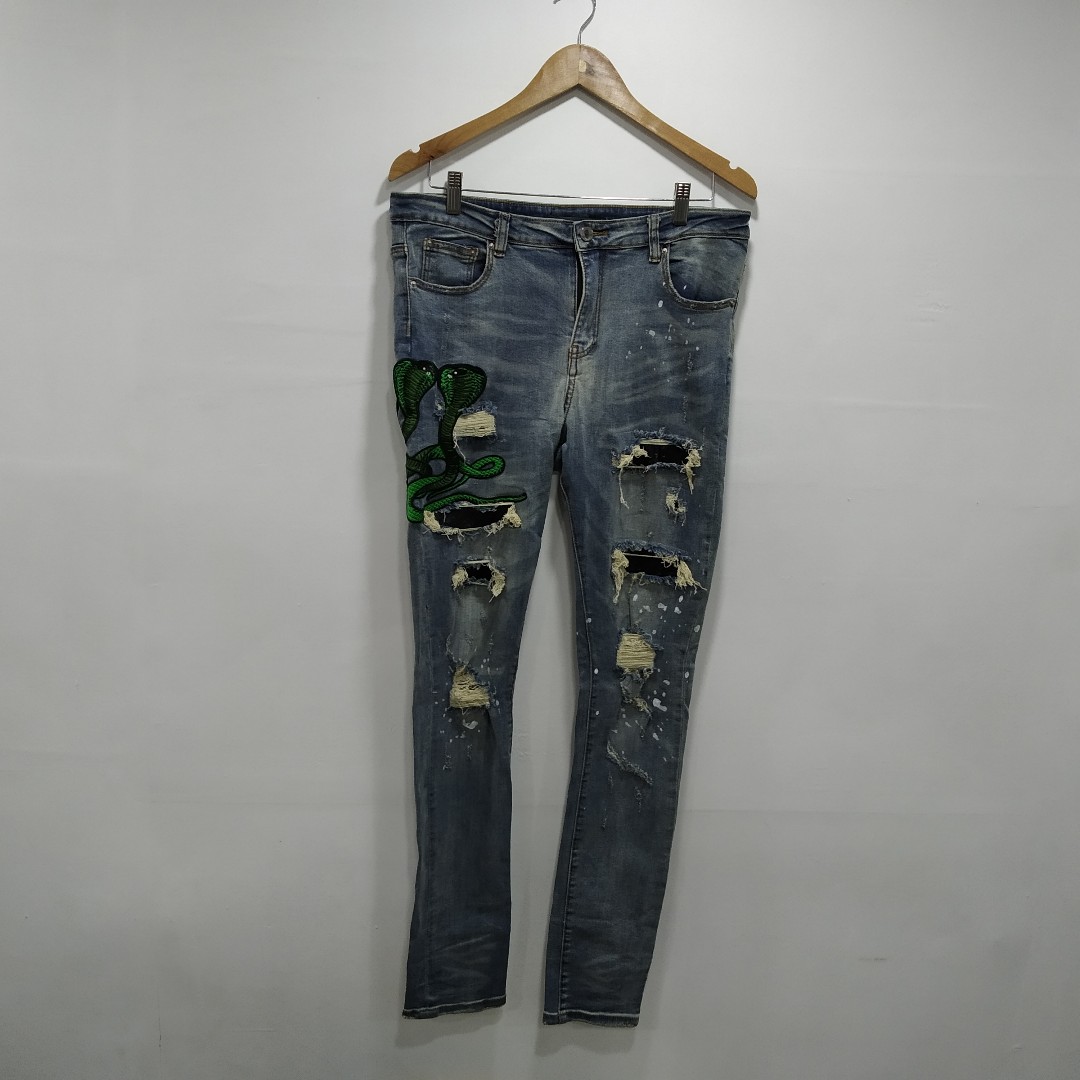 amiri snake patch jeans