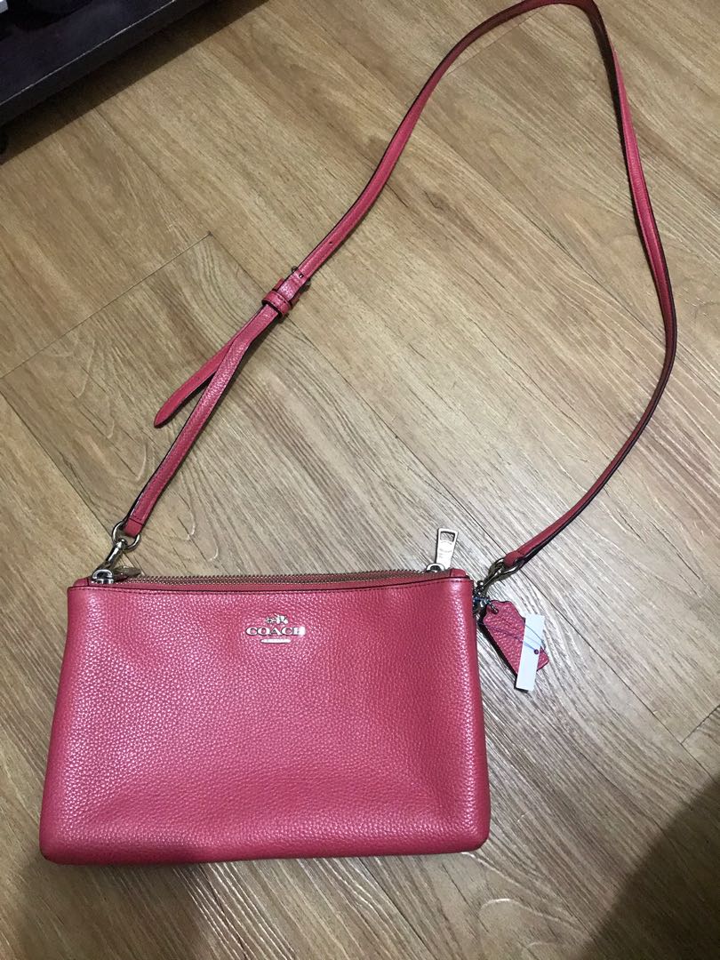 coach pink sling bag