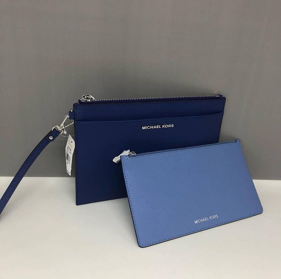 Michael kors jet set 2025 travel xl pop out clutch