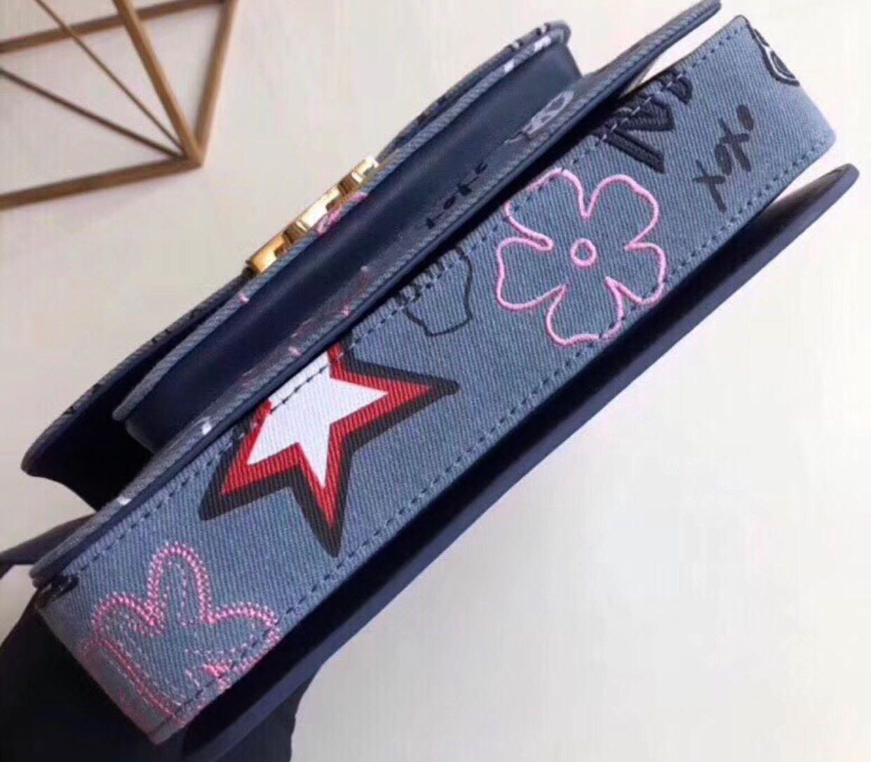 sloan editor embroidered denim shoulder bag