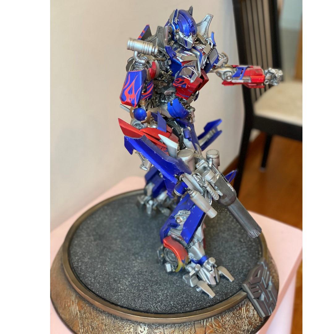 Threezero Transformers: Bumblebee Optimus Prime (Cybertron Mode) DLX A – 's Collectibles