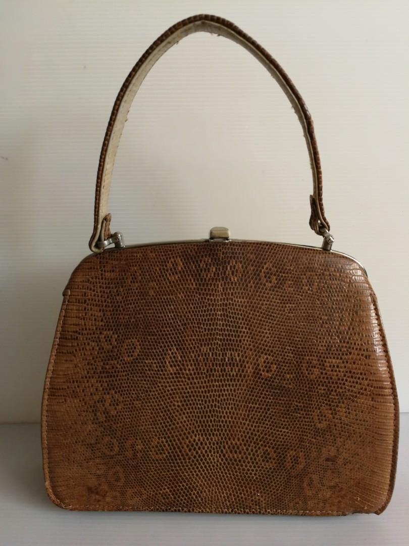 Women's bags & wallets (Category: Purses & Pouches) located in Muntinlupa City. Submitted by mcjek1026 (Listing ID 257544696, Image 3). Description: Unbranded vintage lizzard leather party bag with silk lining. Minor flaw not noticeable. Clean lining. Pls check pics to appreciate. #choosetocare.